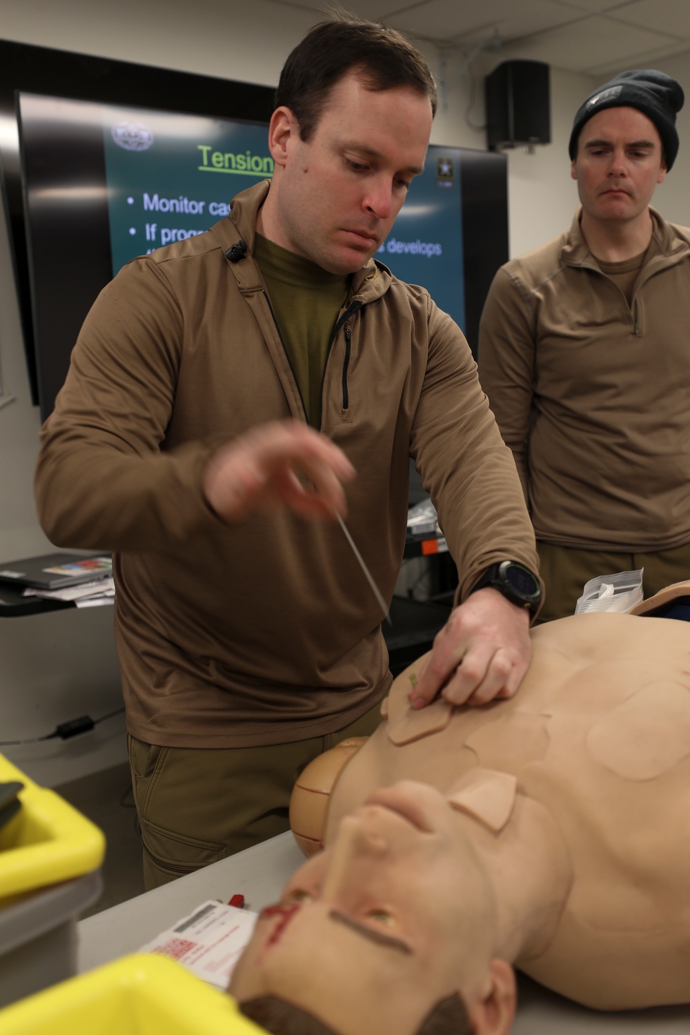 U.S. Navy Hospital Corpsman demonstrates medical procedures