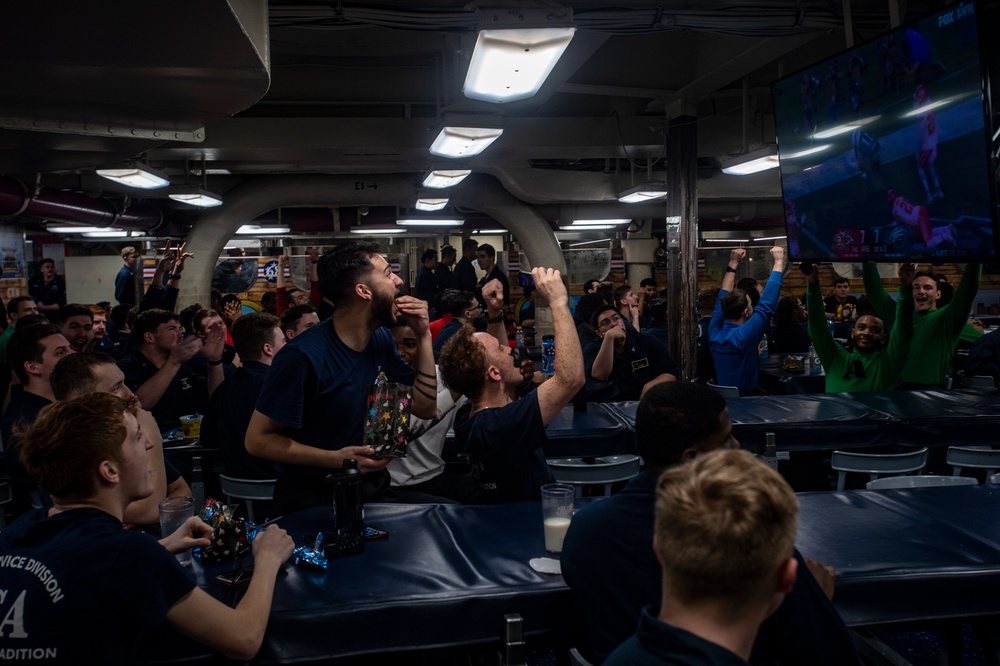 Sailors Watch Football