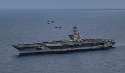 Aircraft Fly Over USS Nimitz