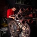 Sailor Inspects Aircraft Gun