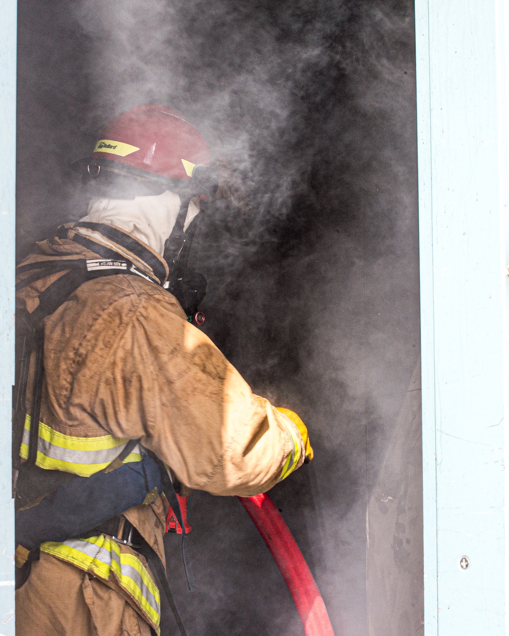 Airmen train in high-rise rescue, firefighting