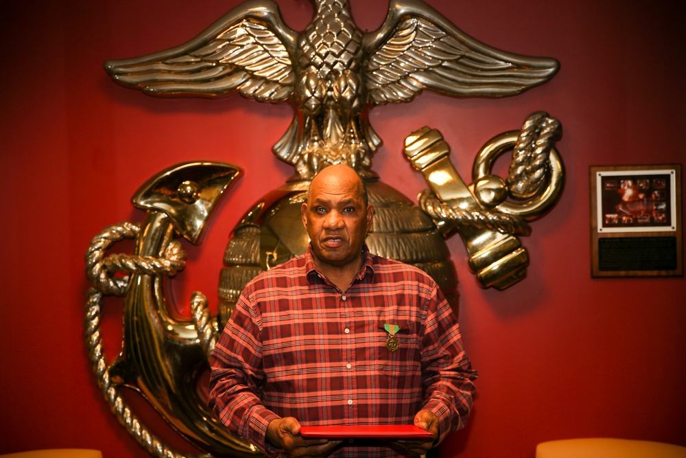 Mr. Nathaniel Bing is awarded the Navy Civilian Service Achievement Medal