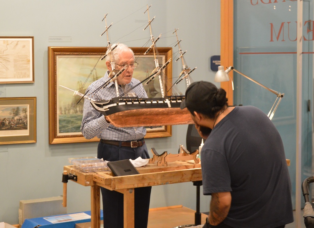 Model shipbuilder at Naval Museum