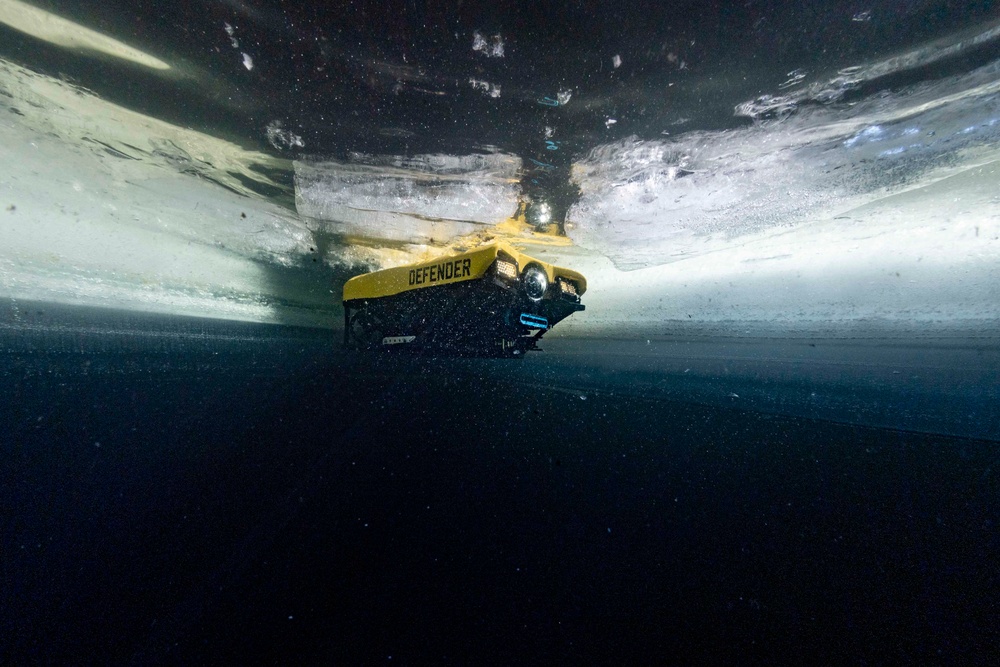 VR Defender Enters Water Below The Ice