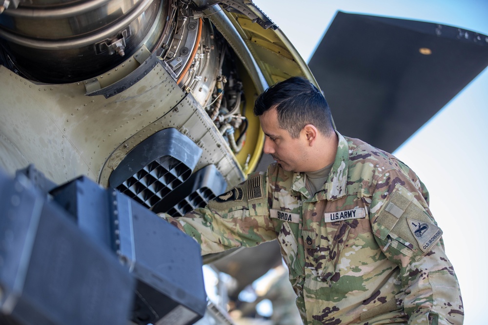 U.S. Army Soldier Performs Post-Flight Maintenance