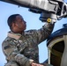 U.S. Army Soldier Performs Post-Flight Maintenance