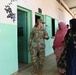 Commanding General of Combined Joint Task Force – Horn of Africa reads to children at the Balbala 3 School