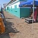 Commanding General of Combined Joint Task Force – Horn of Africa reads to children at the Balbala 3 School