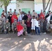 Commanding General of Combined Joint Task Force – Horn of Africa reads to children at the Balbala 3 School