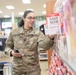 Soldier clips on: 11th ADA Bde. Soldier saves at the register, helps others