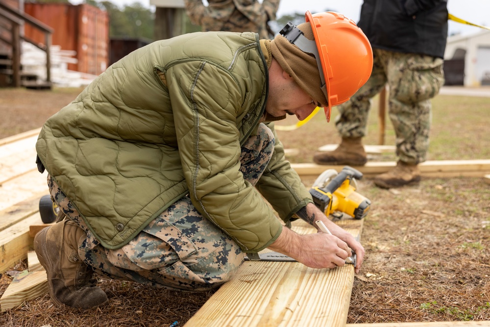 U.S. Marines with 8th Engineer Support Battalion and U.S. Navy Seabees Construct Wooden Structures during Exercise Winter Pioneer 23