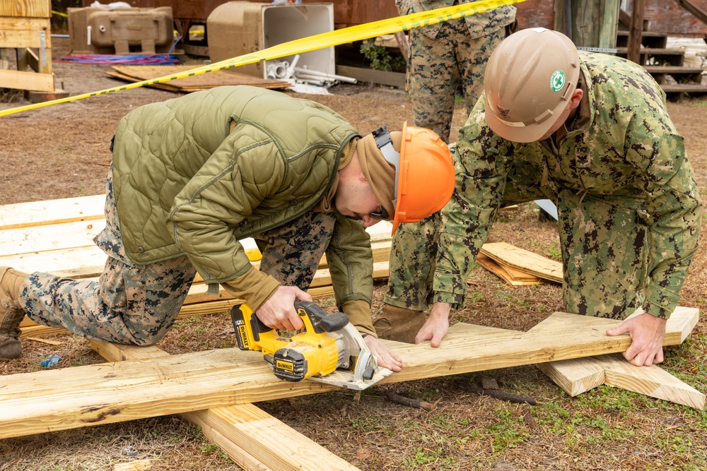 U.S. Marines with 8th Engineer Support Battalion and U.S. Navy Seabees Construct Wooden Structures during Exercise Winter Pioneer 23