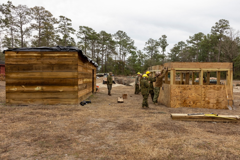 U.S. Marines with 8th Engineer Support Battalion and U.S. Navy Seabees Construct Wooden Structures during Exercise Winter Pioneer 23