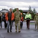 Beeman family members walk with district commander, Col. Helton, to christen USACE survey vessel Beeman.