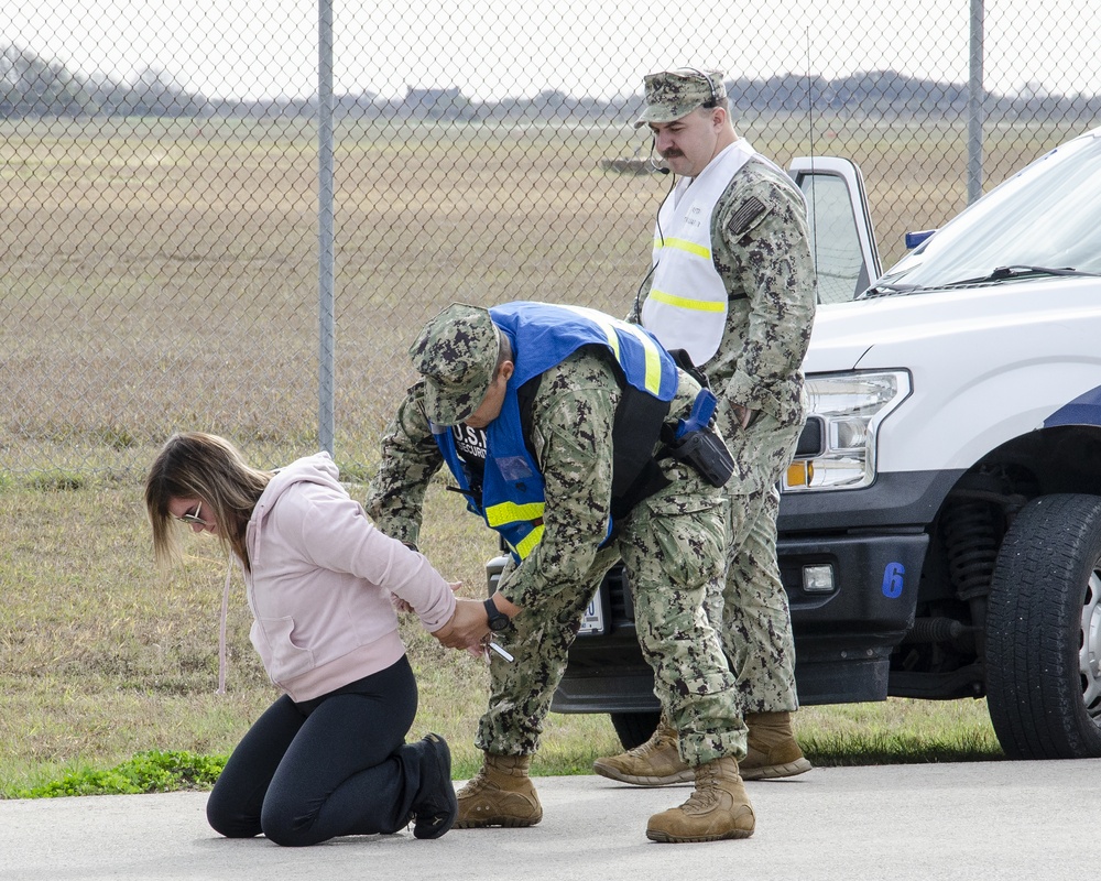 'Gate runner' taken into custody