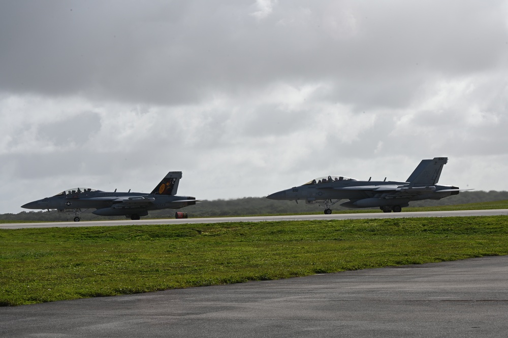 U.S. Navy F/A-18 Hornet prepares for take off