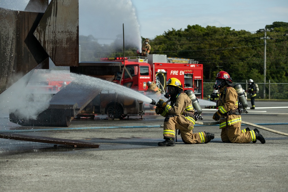 Bilateral exercise on Camp Hansen familiarizes Marines and firefighters with responding to aircraft mishap