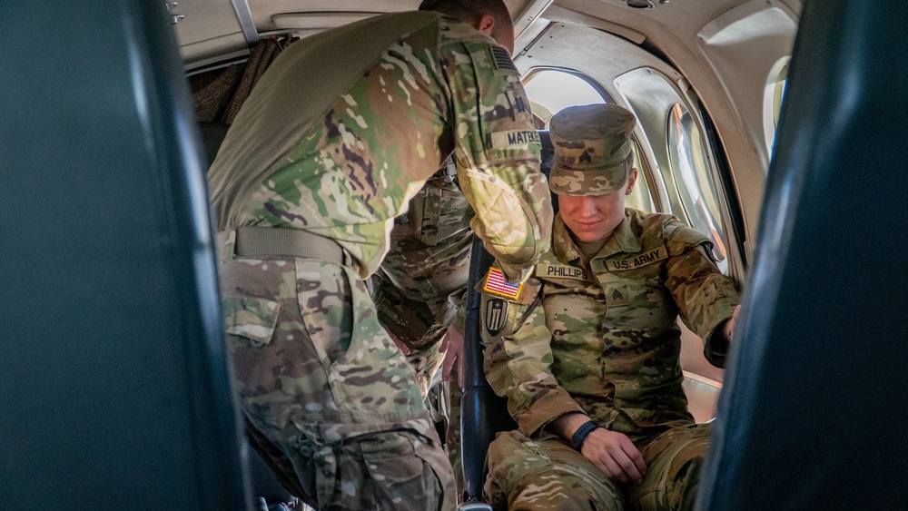 JA23 participants practice CASEVAC with a C12