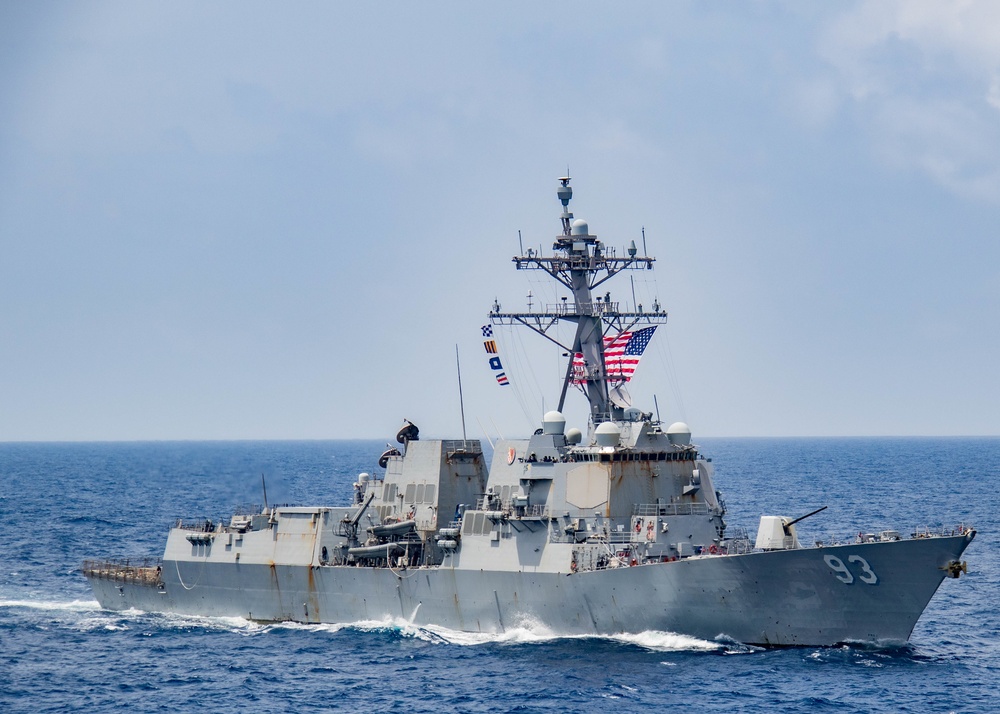 The USS Chung-Hoon steams alongside the USS Nimitz