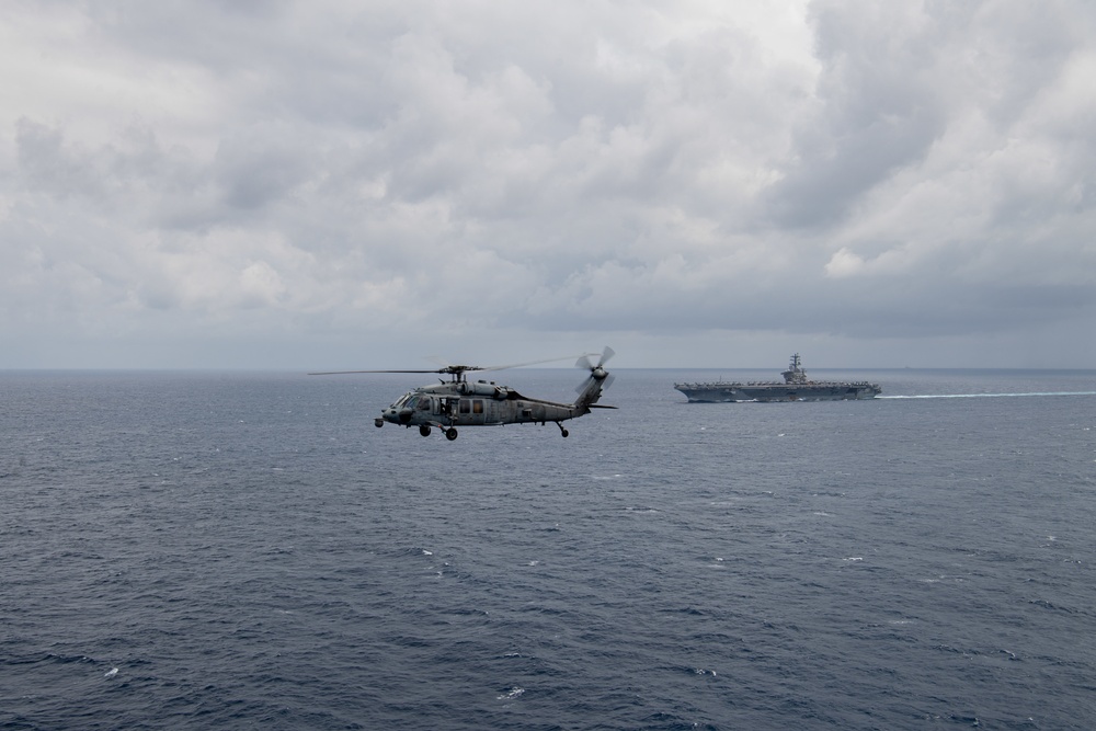 Nimitz Carrier Strike Group And Makin Island Amphibious Readiness Group Conduct Photoex Exercise