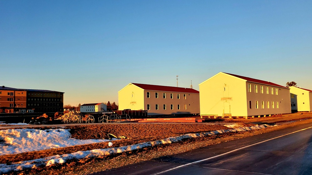 Contractors moving four World War II-era barracks buildings at Fort McCoy