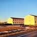 Contractors moving four World War II-era barracks buildings at Fort McCoy