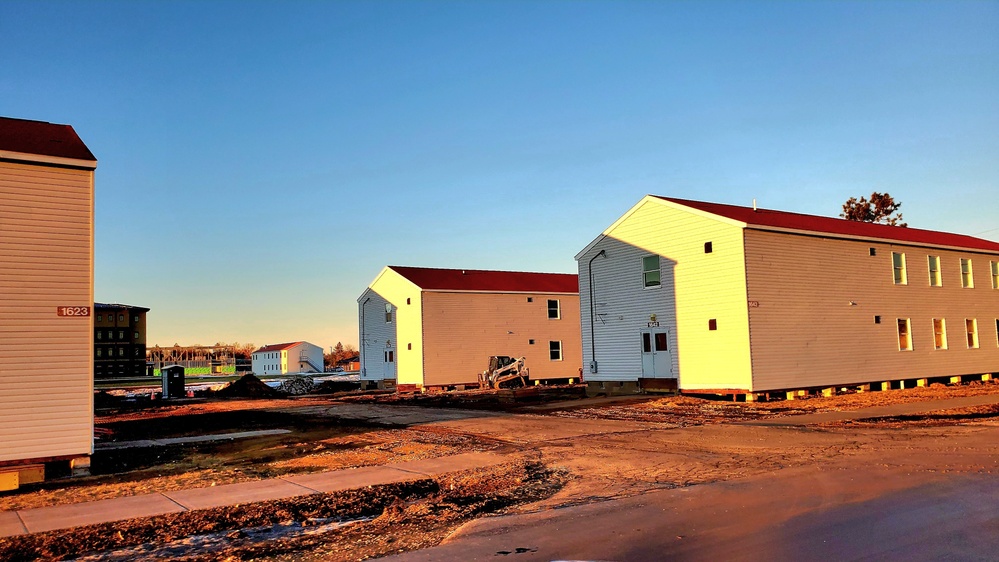 Contractors moving four World War II-era barracks buildings at Fort McCoy