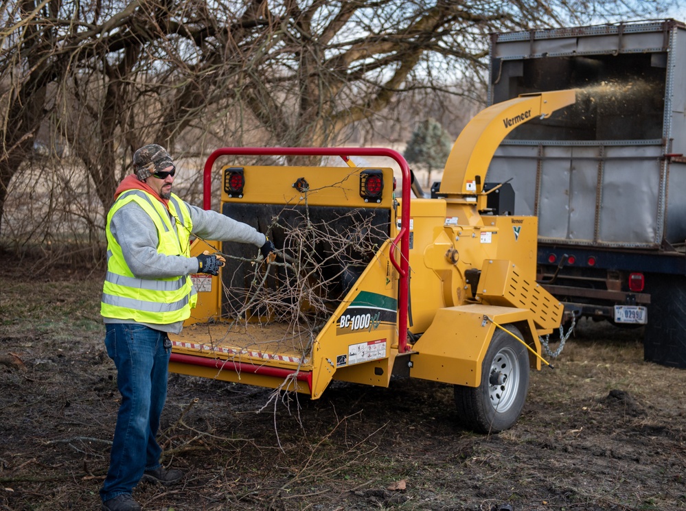 Base ground crew clears land for helipad