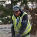 Base ground crew clears land for helipad