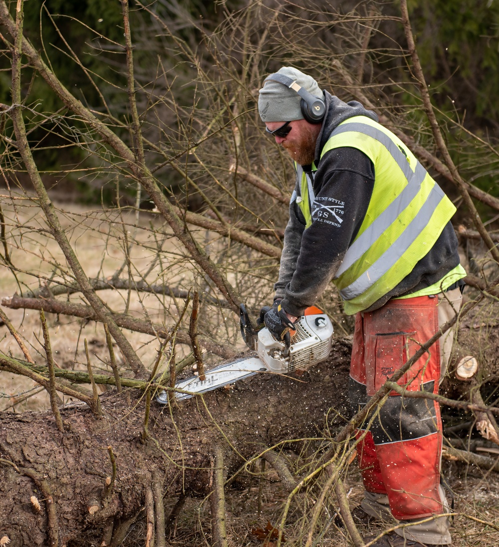 Base ground crew clears land for helipad