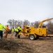 Base ground crew clears land for helipad