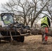 Base ground crew clears land for helipad