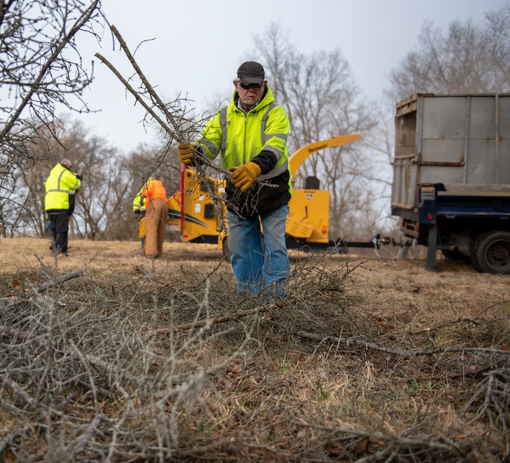 Base ground crew clears land for helipad
