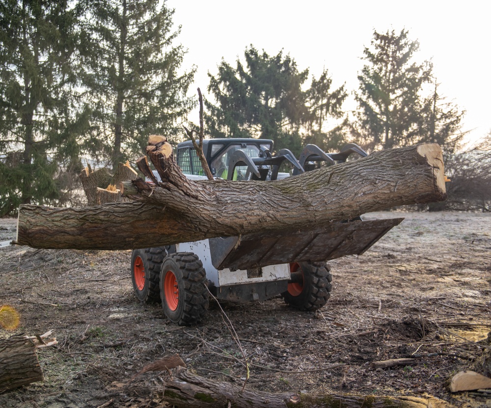 Base ground crew clears land for helipad