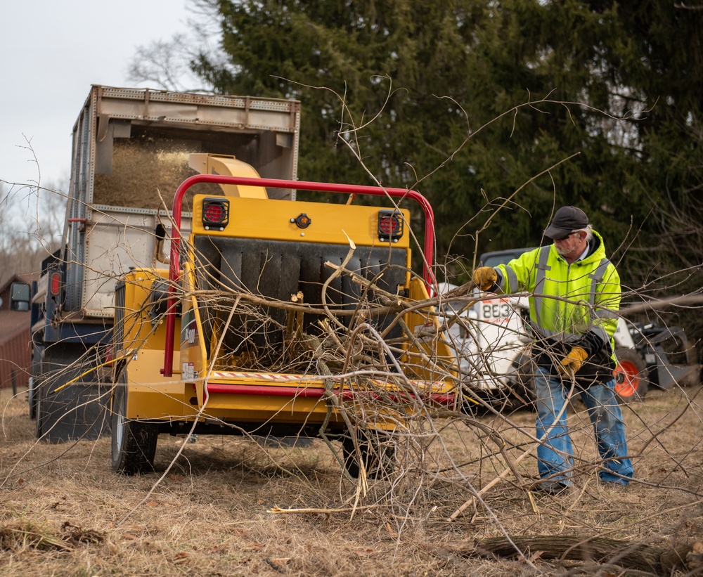 Base ground crew clears land for helipad
