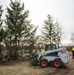 Base ground crew clears land for helipad