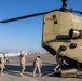 A US Army CH-47 Chinook is loaded with humanitarian aid supplies