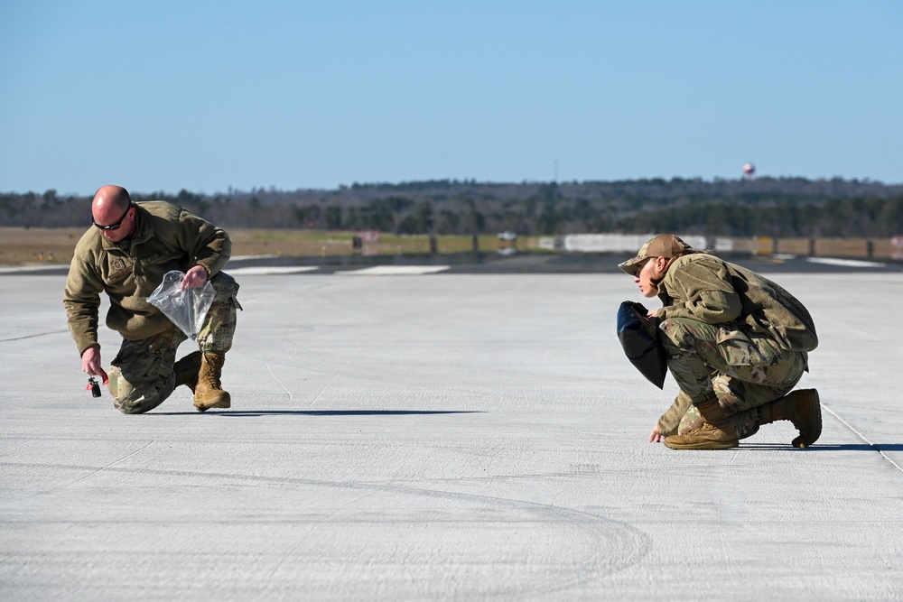 169th Fighter Wing Airmen conduct FOD walk on runway