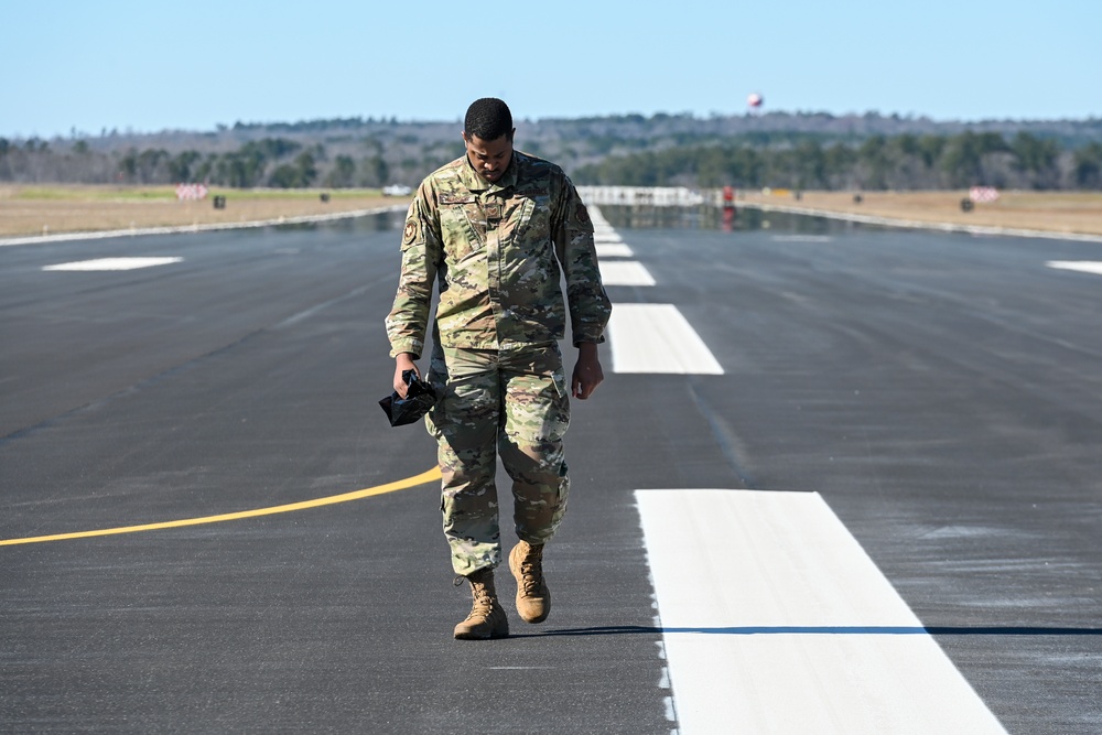 169th Fighter Wing Airmen conduct FOD walk on runway