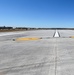 169th Fighter Wing Airmen conduct FOD walk on runway