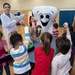 Hanscom dental clinic visits with students at primary school