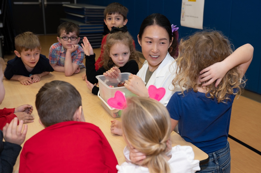 Hanscom dental clinic visits with students at primary school