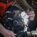 U.S. Navy Diver prepares to go ice diving in Little Falls, Minnesota