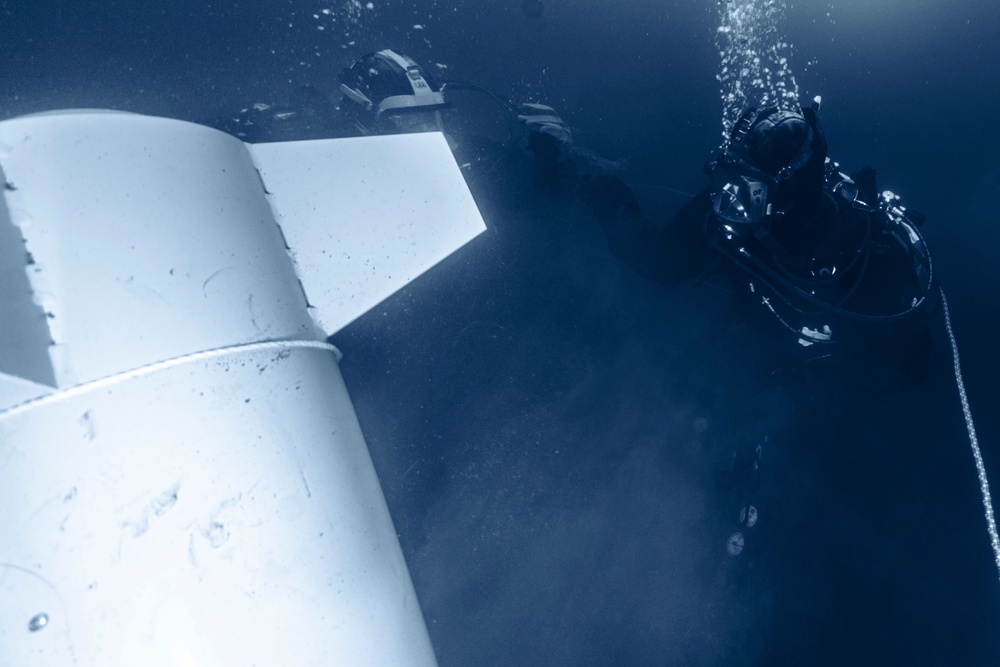 U.S. Navy Explosive Ordnance Disposal (EOD) Technician goes Ice Diving