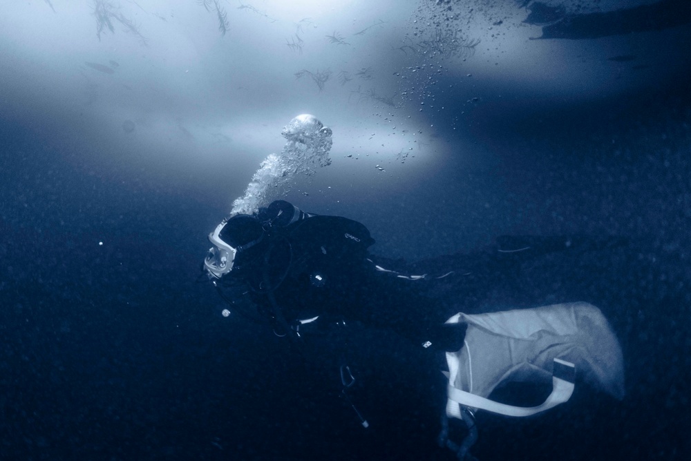 U.S. Navy Diver Goes Ice Diving