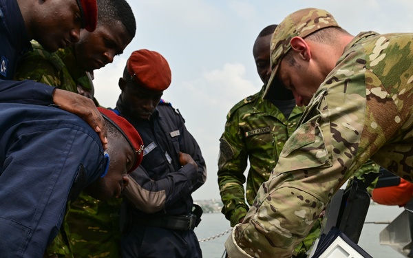 USCGC Spencer (WMEC 905) conducts boarding procedure training with the Ivorian Navy and Gendarmerie