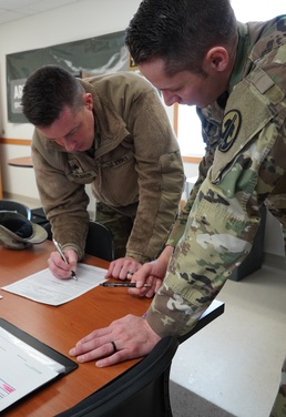Signing Reenlistment Paperwork