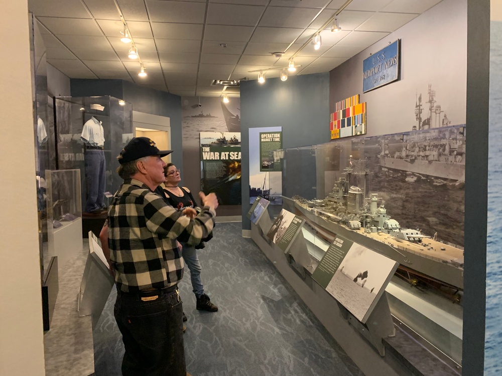 Museum volunteer leads guided tour