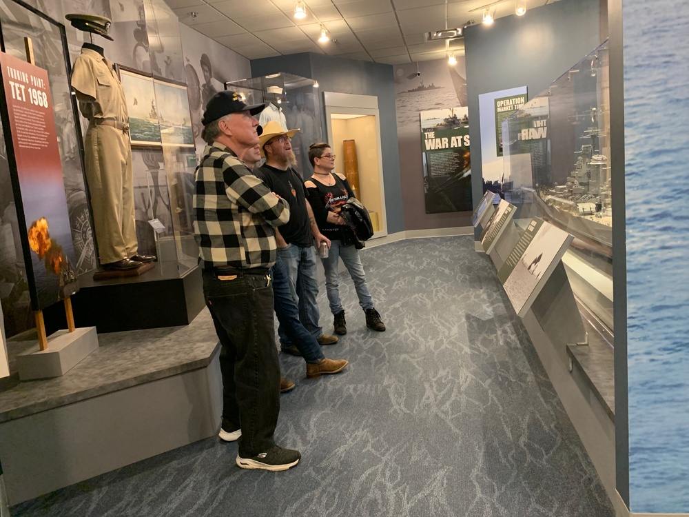 Museum volunteer leads guided tour