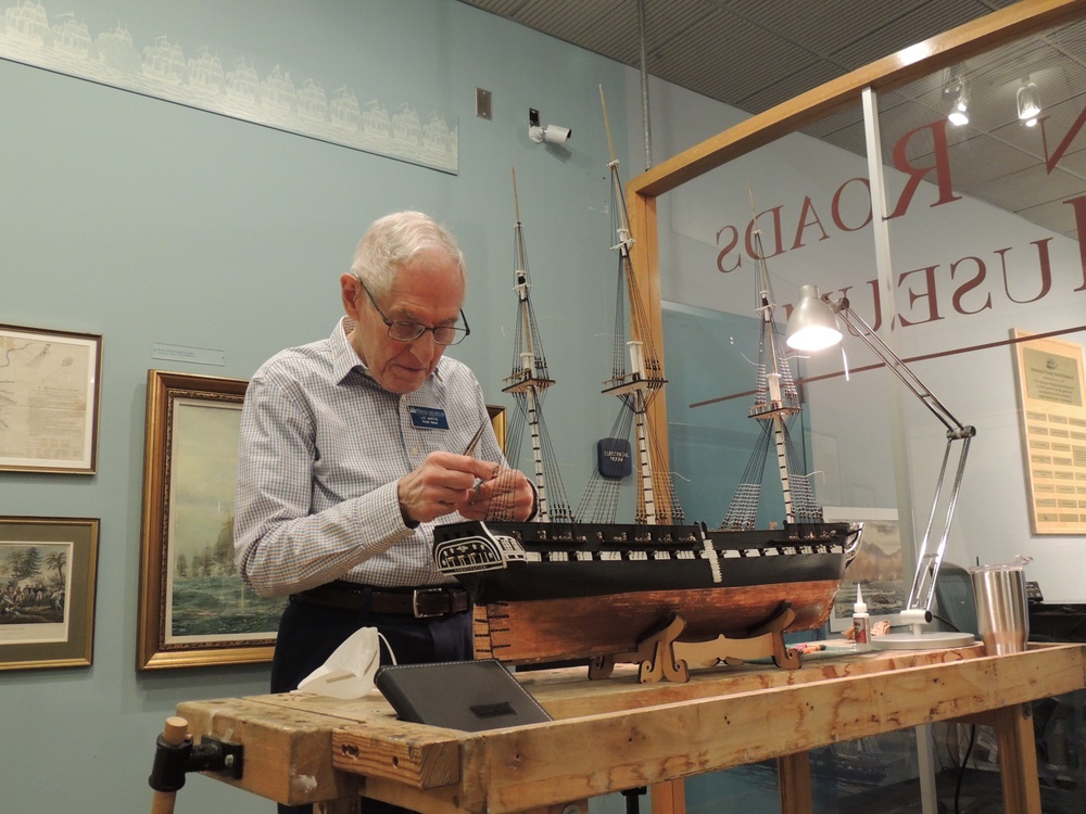 Model shipbuilder at Naval Museum